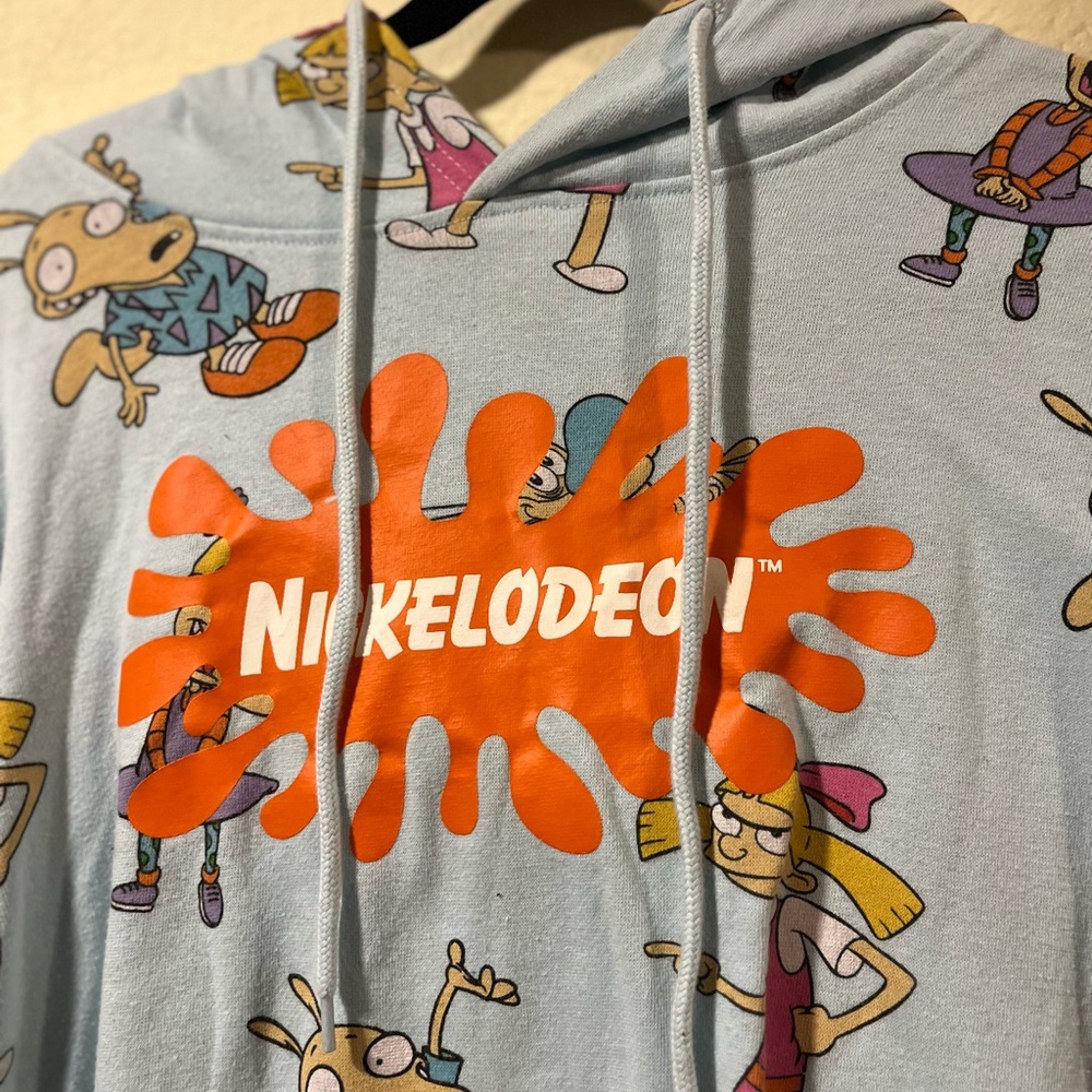 Nickelodeon Light Blue Hoodie with Orange Logo and Cartoon Characters